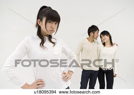 Picture - Young woman and couple. Fotosearch