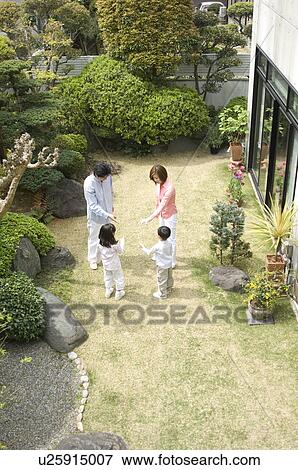 Family playing a game of rock scissors paper View Large Photo Image Stock Photo - Family playing a game of rock scissors paper . Fotosearch