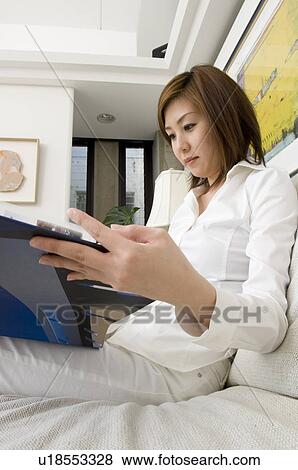 Woman reading book View Large Photo Image Stock Photo - Woman reading book. Fotosearch