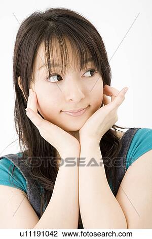 Stock Image - Portrait of young woman. Fotosearch