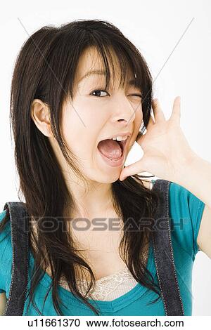 Stock Image - Portrait of young woman. Fotosearch