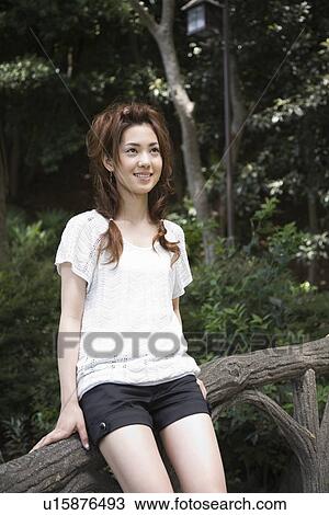 Stock Image - Portrait of young woman. Fotosearch