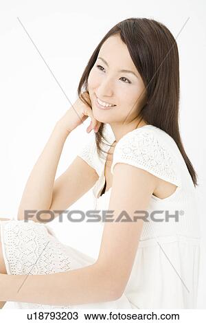 Stock Image - Portrait of young woman. Fotosearch