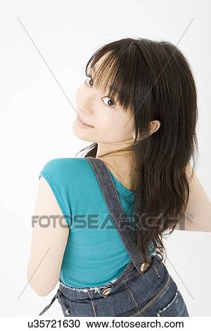 Stock Image - Portrait of young woman. Fotosearch