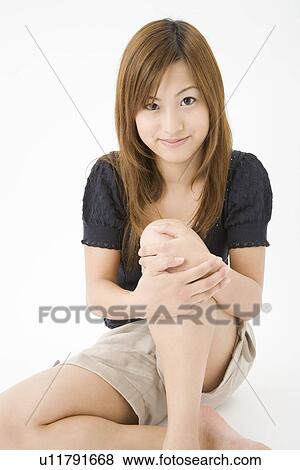 Portrait of young woman View Large Photo Image Stock Photo - Portrait of young woman. Fotosearch