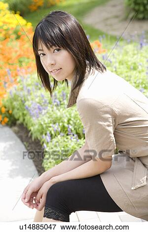 Stock Photo - Portrait of young woman. Fotosearch