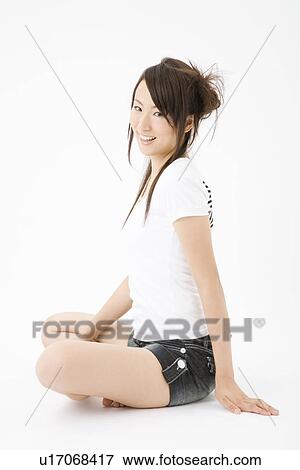 Portrait of young woman View Large Photo Image Stock Photo - Portrait of young woman. Fotosearch
