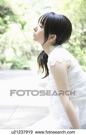 Stock Photo - Portrait of young woman. Fotosearch