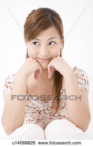 Stock Photograph - Portrait of young woman. Fotosearch