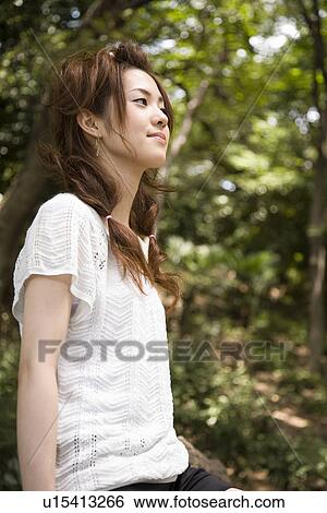 Stock Photograph - Portrait of young woman. Fotosearch