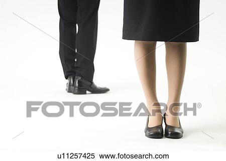 Legs of two business people View Large Photo Image Stock Photography - Legs of two business people. Fotosearch