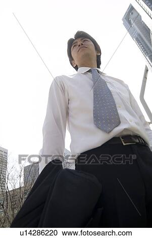 Stock Image - Portrait of businessman. Fotosearch