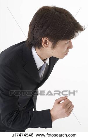 Stock Photograph - Portrait of young businessman. Fotosearch