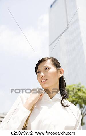 Stock Image - Portrait of young businesswoman. Fotosearch