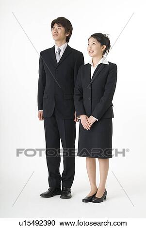 Portrait of young couple wearing suit View Large Photo Image Stock Image - Portrait of young couple wearing suit. Fotosearch