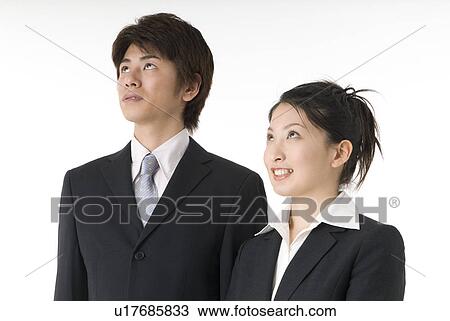 Portrait of young couple wearing suit View Large Photo Image Stock Image - Portrait of young couple wearing suit. Fotosearch
