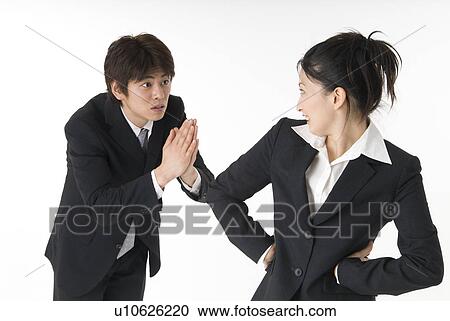 Young businessman apologizing View Large Photo Image Stock Image - Young businessman apologizing. Fotosearch