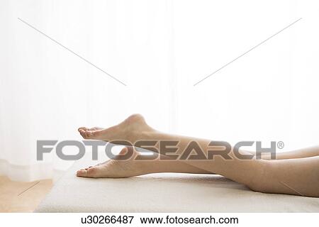Stock Photo - Legs of young woman. Fotosearch