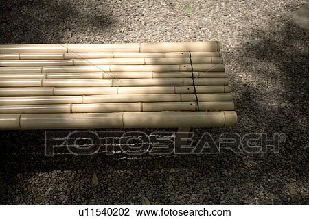 Stock Image - Bench made of bamboo. Fotosearch