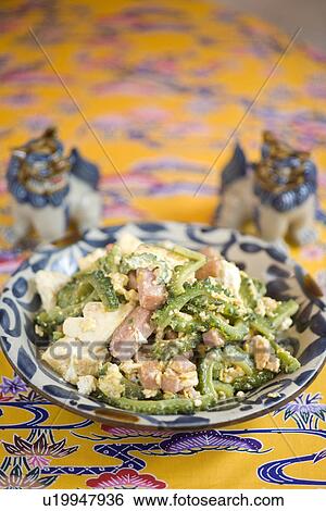 Stock Photograph - Fried bitter gourd. Fotosearch