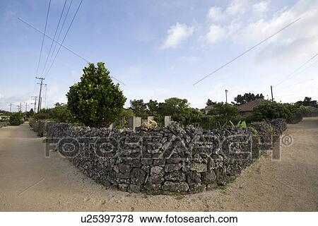 Stock Photo - Stone wall in Taketomi Island, Okinawa, Japan. Fotosearch