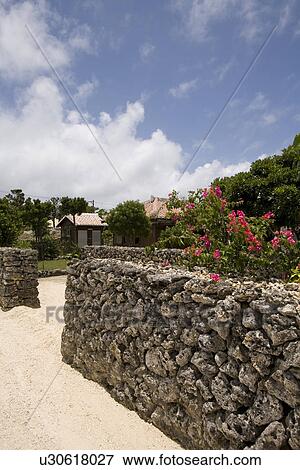 Stone wall in Taketomi Island, Okinawa Prefecture, Japan View Large Photo Image Stock Photo - Stone wall in Taketomi Island, Okinawa Prefecture, Japan. Fotosearch