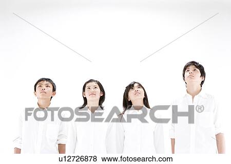 Four middle school students looking up View Large Photo Image Stock Photo - Four middle school students looking up. Fotosearch