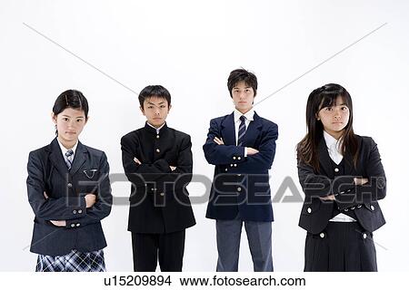 Four middle school students standing View Large Photo Image Picture - Four middle school students standing. Fotosearch