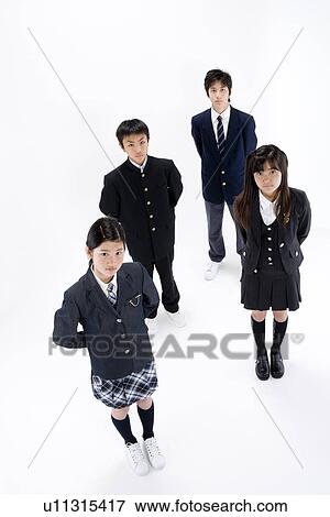 Four middle school students standing View Large Photo Image Stock Photo - Four middle school students standing. Fotosearch