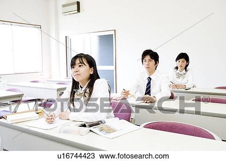 Stock Image - Middle school students studying. Fotosearch