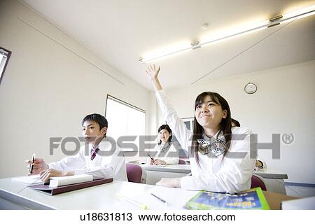 Stock Image - Middle school students studying. Fotosearch