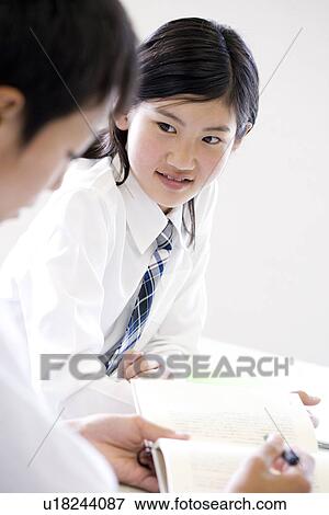Middle school students studying View Large Photo Image Stock Photo - Middle school students studying. Fotosearch
