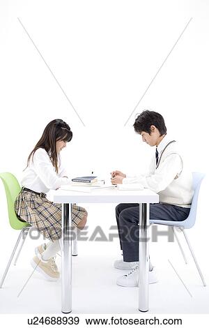 Stock Photo - Middle school students studying. Fotosearch