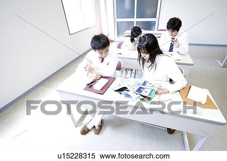 Stock Photography - Middle school students studying. Fotosearch