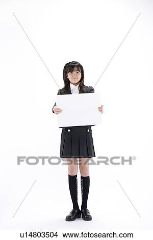Picture - Teenage girl holding blank message board. Fotosearch