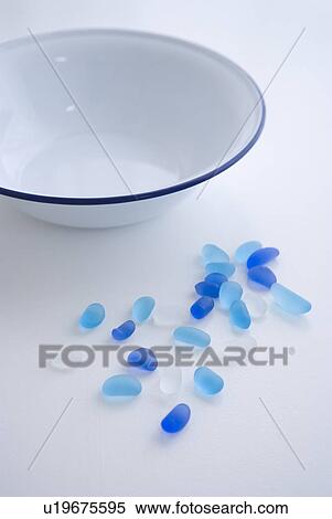 Stock Photography - Glass beads and washing bowl. Fotosearch