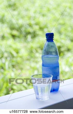 Mineral water and glass View Large Photo Image Stock Photo - Mineral water and glass. Fotosearch