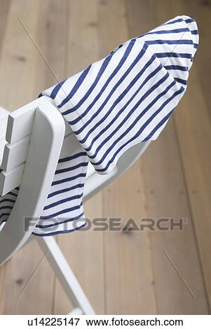 Stock Photo - Shirt on chair. Fotosearch