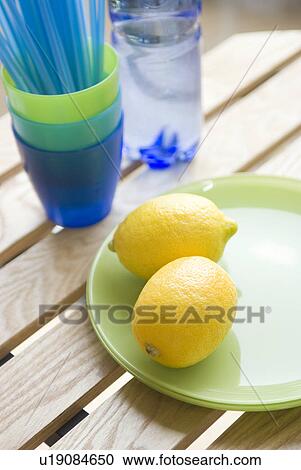 Stock Image - Straws in plastic cup. Fotosearch