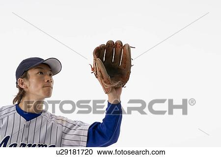 Baseball player trying to catch a ball View Large Photo Image Stock Image - Baseball player trying to catch a ball. Fotosearch