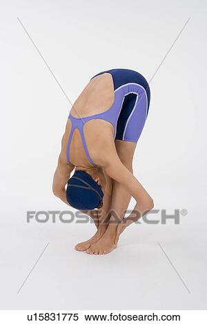 Female swimmer stretching View Large Photo Image Stock Photography - Female swimmer stretching. Fotosearch