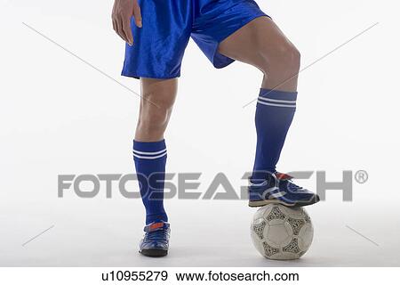 Legs of soccer player View Large Photo Image Stock Photo - Legs of soccer player. Fotosearch