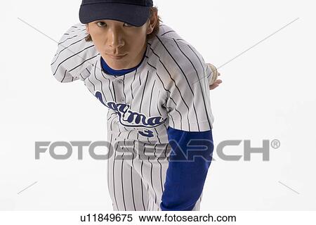 Pitcher preparing to throw a ball View Large Photo Image Stock Photography - Pitcher preparing to throw a ball. Fotosearch