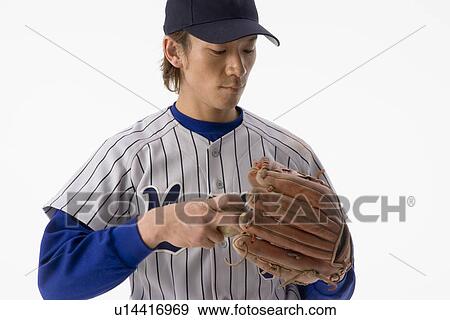 Stock Photo - Portrait of pitcher. Fotosearch