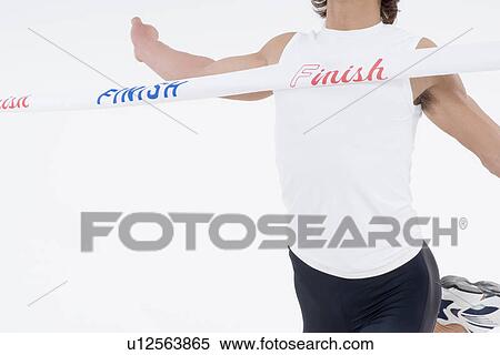 Runner finishing in first place View Large Photo Image Stock Photography - Runner finishing in first place. Fotosearch