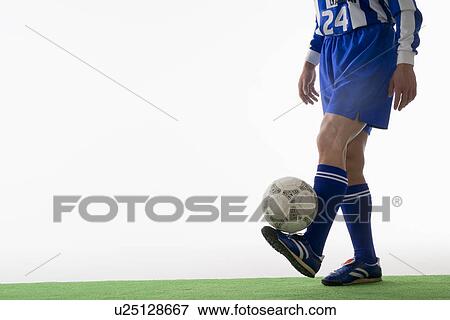 Soccer player juggling ball View Large Photo Image Stock Photo - Soccer player juggling ball. Fotosearch