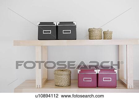 Baskets and boxes on shelf View Large Photo Image Stock Image - Baskets and boxes on shelf. Fotosearch
