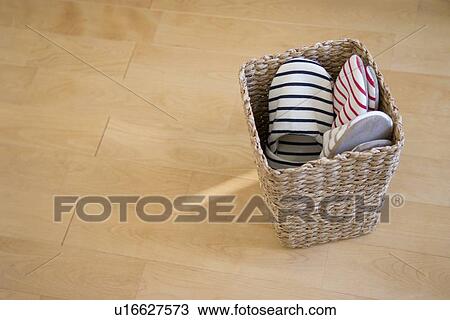 Stock Image - Baskets and boxes on shelf. Fotosearch