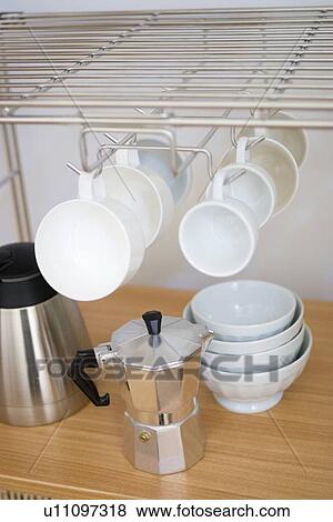 Stock Photo - Cups hanging. Fotosearch