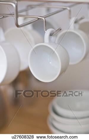 Stock Photo - Cups hanging. Fotosearch